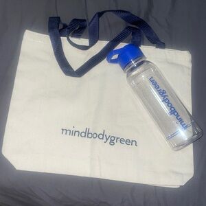 mindbodygreen water bottle and a tote bag